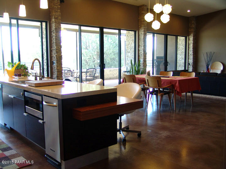 19925 North Lower Territory Road Prescott, AZ 86305 - Photo 13 of 41 a dining hall with furniture window and wooden floor