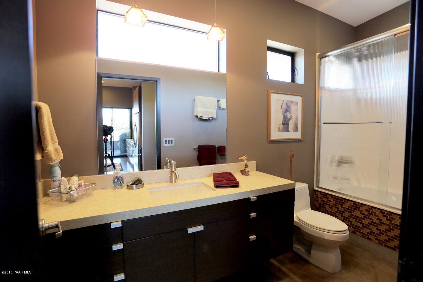 19925 North Lower Territory Road Prescott, AZ 86305 - Photo 16 of 41 a bathroom with a sink vanity mirror and toilet