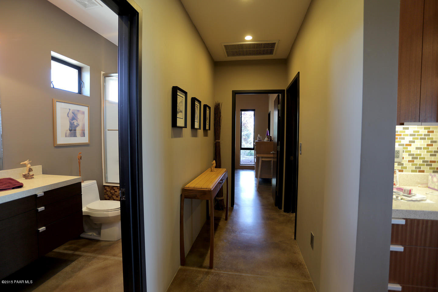 19925 North Lower Territory Road Prescott, AZ 86305 - Photo 17 of 41 a en suite bathroom with a sink mirror and vanity