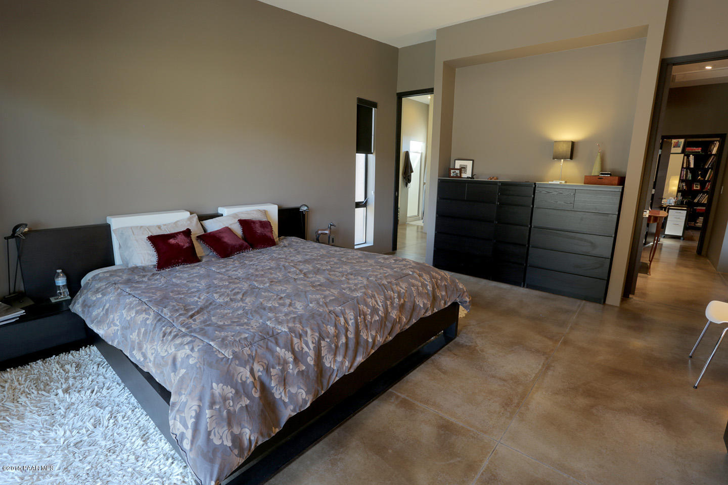 19925 North Lower Territory Road Prescott, AZ 86305 - Photo 19 of 41 a bedroom with a bed and walk in closet