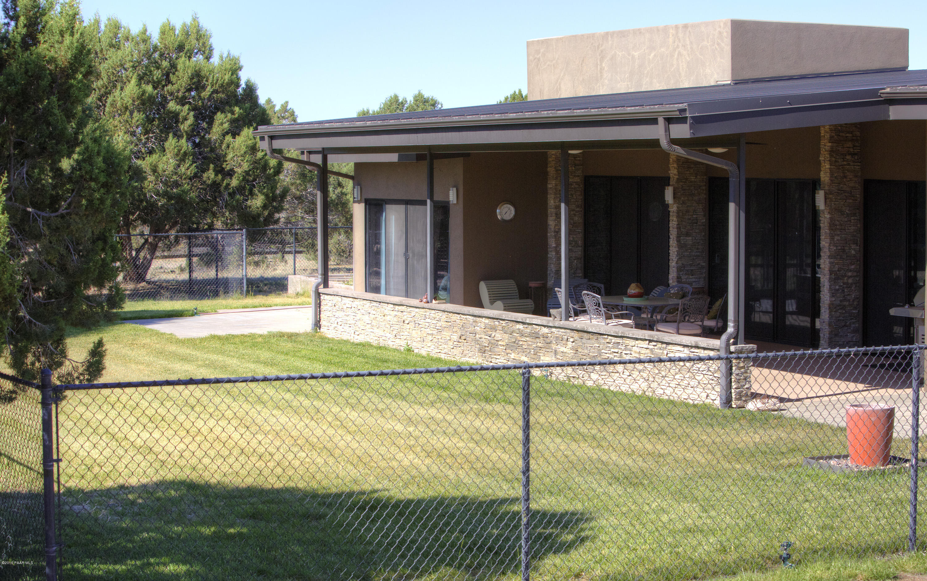 19925 North Lower Territory Road Prescott, AZ 86305 - Photo 23 of 41 a view of a house with backyard and sitting area