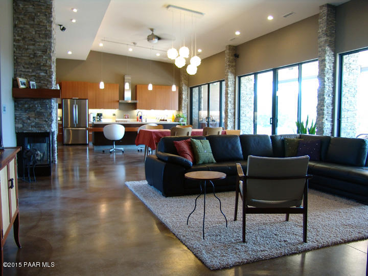 19925 North Lower Territory Road Prescott, AZ 86305 - Photo 40 of 41 a living room with lots of furniture and a large window