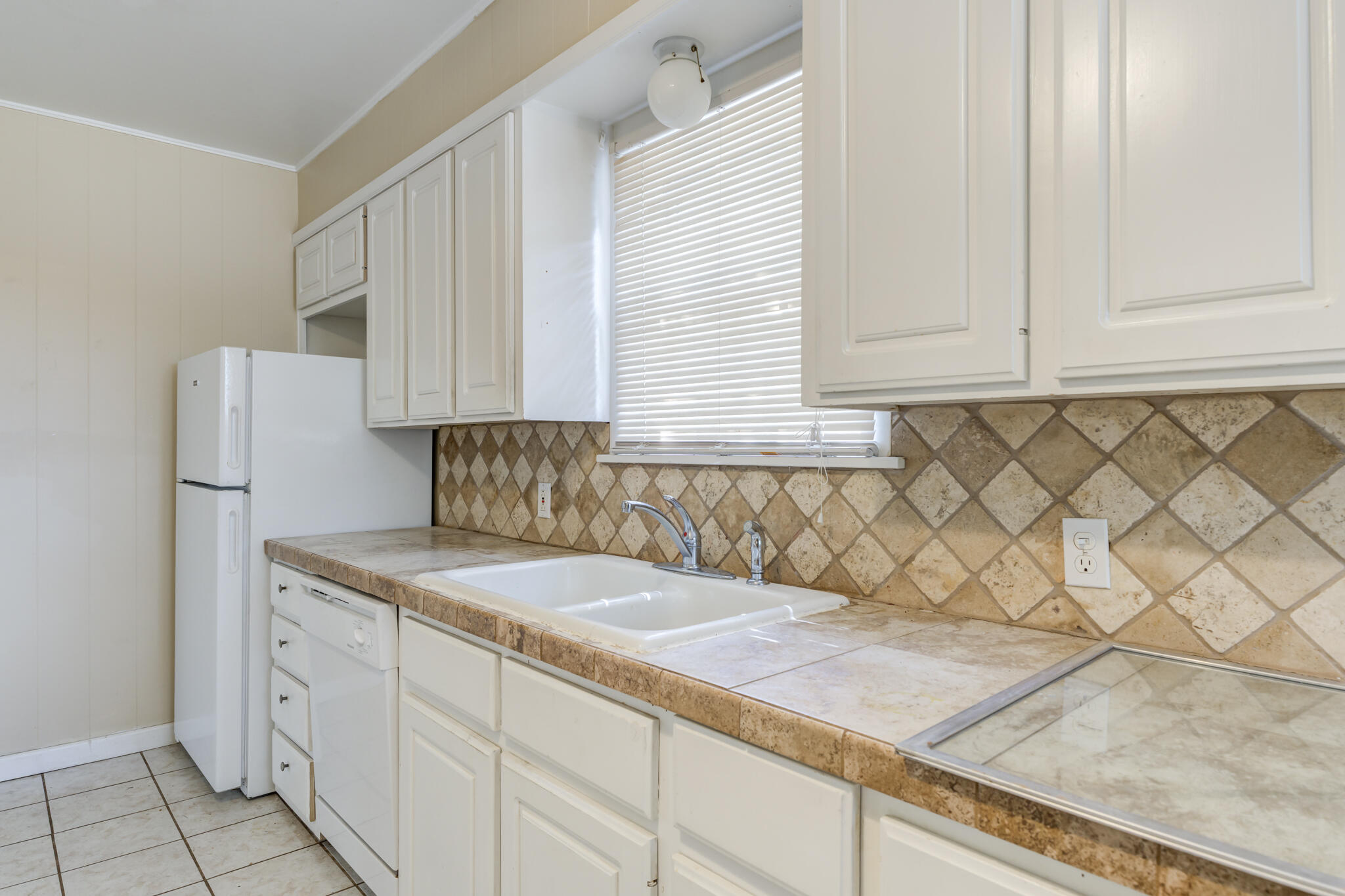 2420 39th Street Lubbock, TX 79412 - Photo 18 of 39 a utility room with a sink