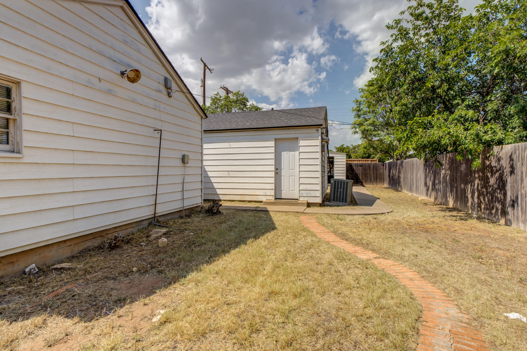 2420 39th Street Lubbock, TX 79412 - Photo 36 of 39 a view of a backyard