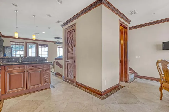 a spacious bathroom with a mirror and a shower