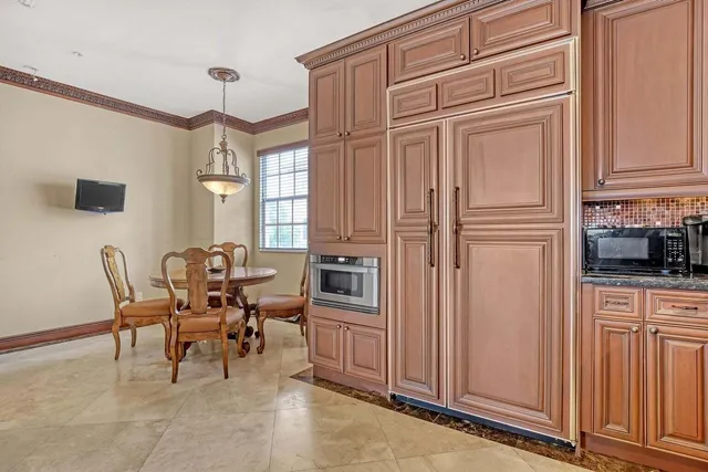 a view of a livingroom with furniture and windows