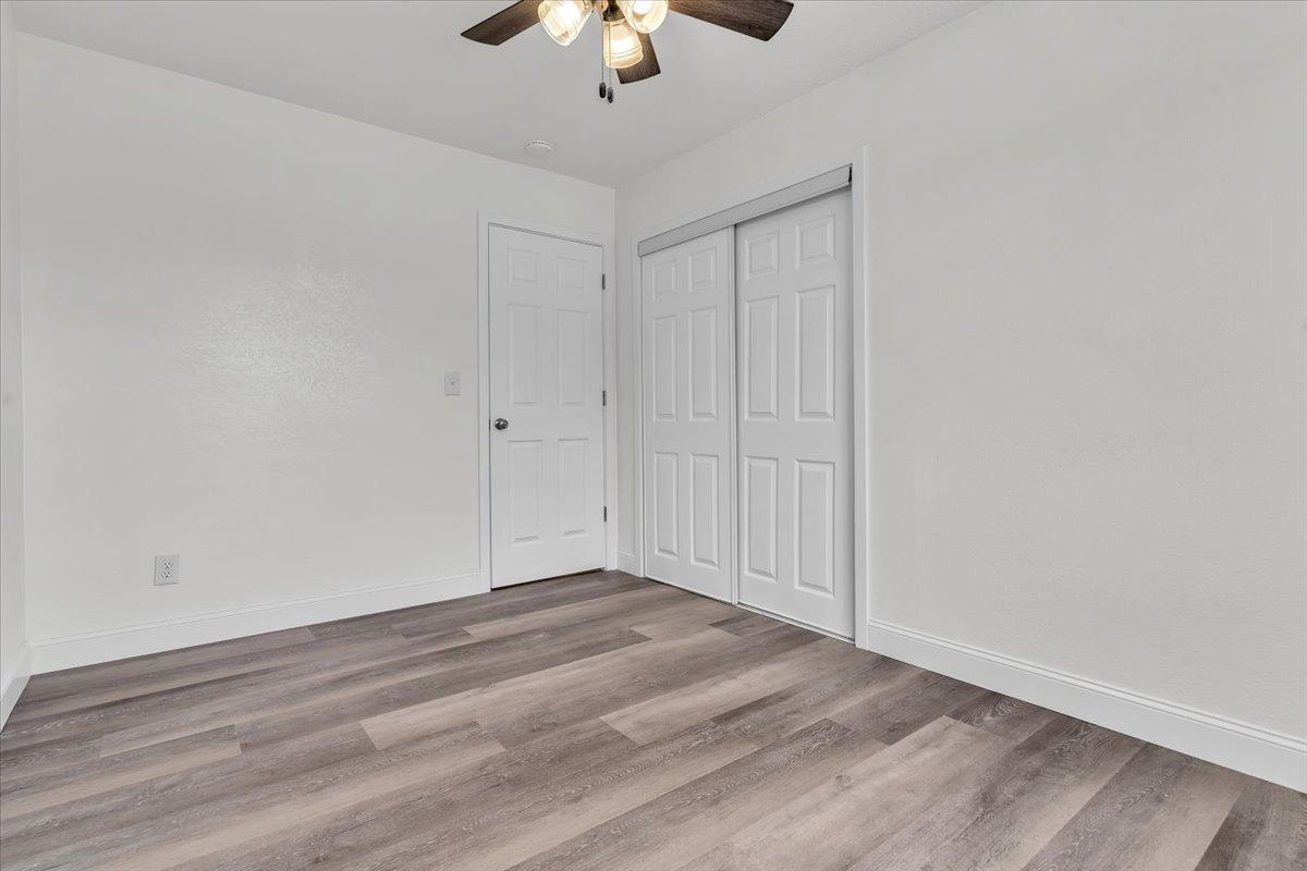 191 Orit Avenue Parlier, CA 93648 - Photo 5 of 25 wooden floor in an empty room