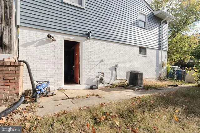 a view of two chairs in front of house
