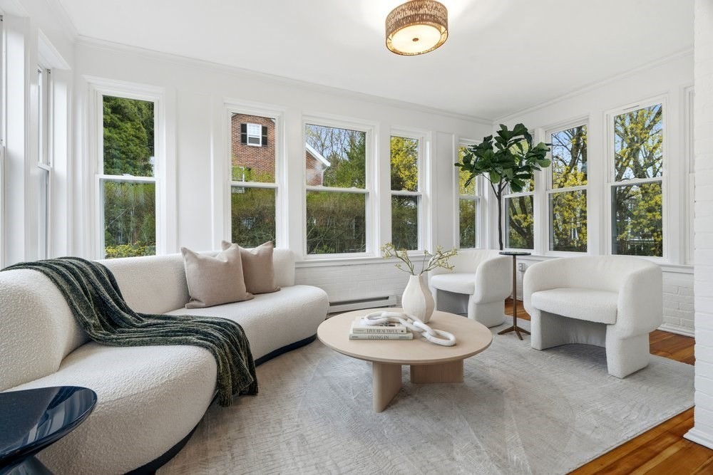 1806 Beacon Street Newton, MA 02468 - Photo 13 of 38 a living room with furniture and a large window