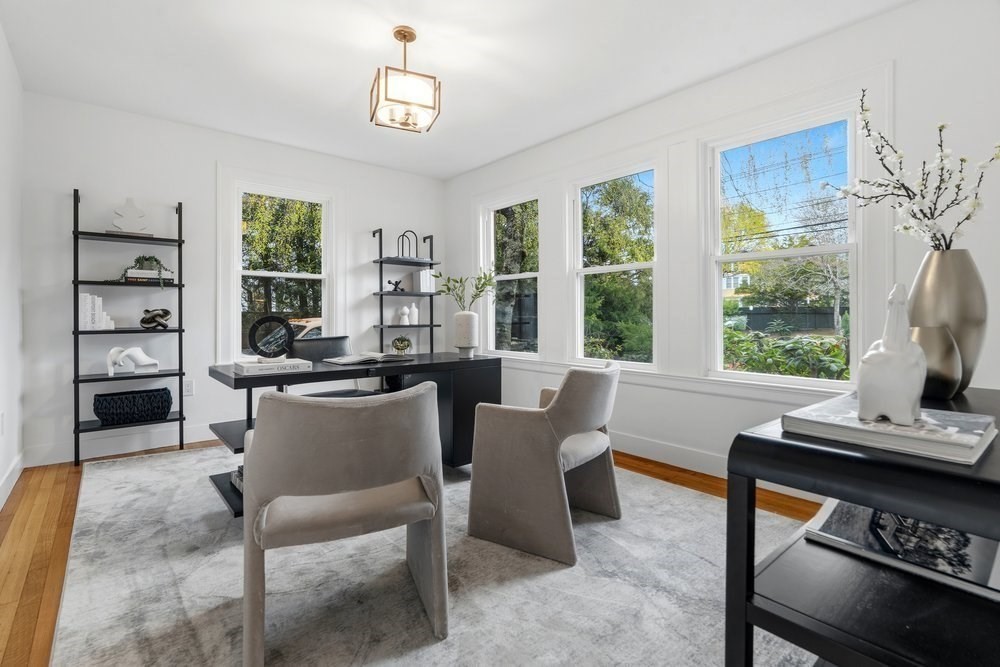 1806 Beacon Street Newton, MA 02468 - Photo 14 of 38 a dining room with furniture a chandelier and window