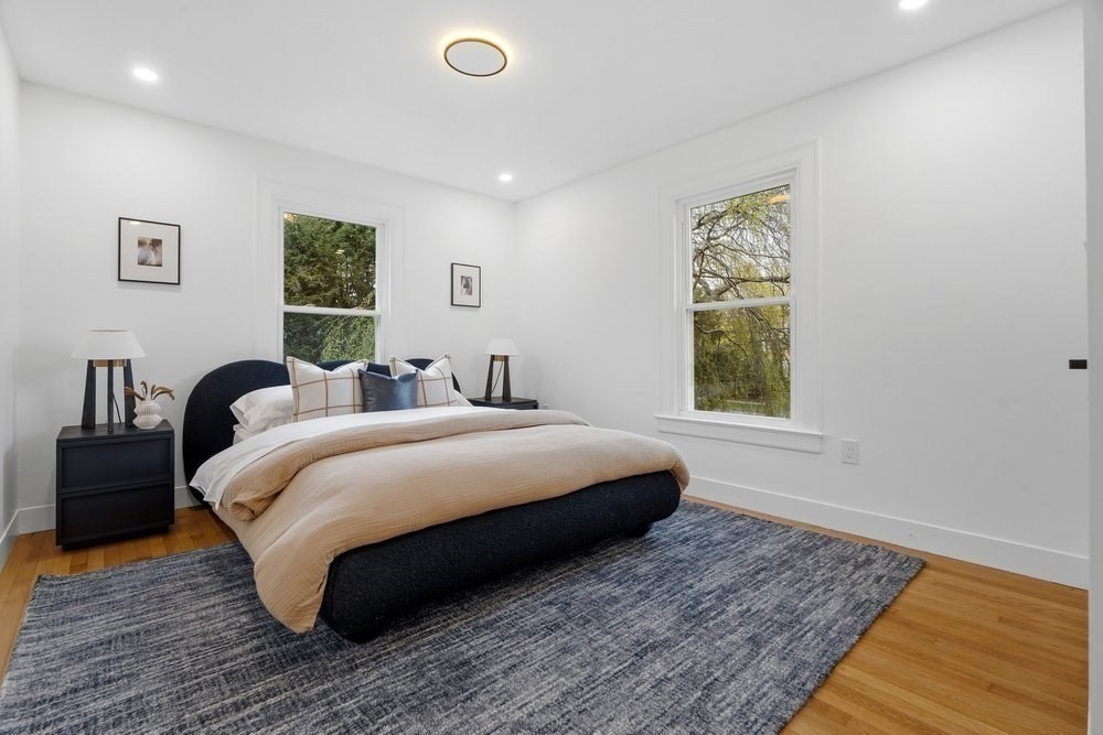1806 Beacon Street Newton, MA 02468 - Photo 21 of 38 a bedroom with a bed and a window