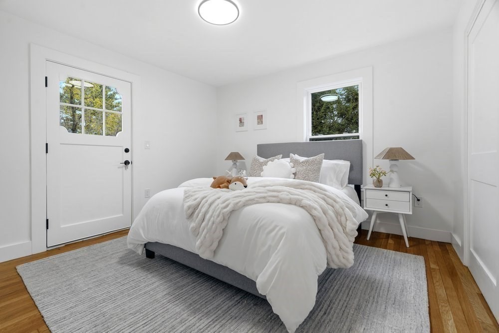 1806 Beacon Street Newton, MA 02468 - Photo 22 of 38 a bedroom with a bed and a window