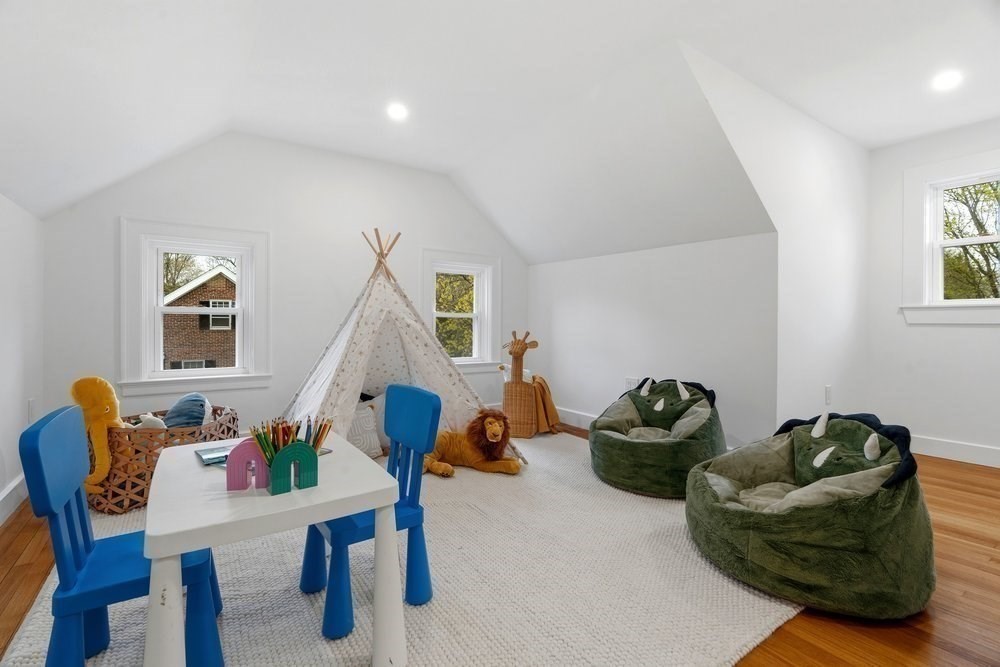 1806 Beacon Street Newton, MA 02468 - Photo 26 of 38 a living room with furniture and a wooden floor