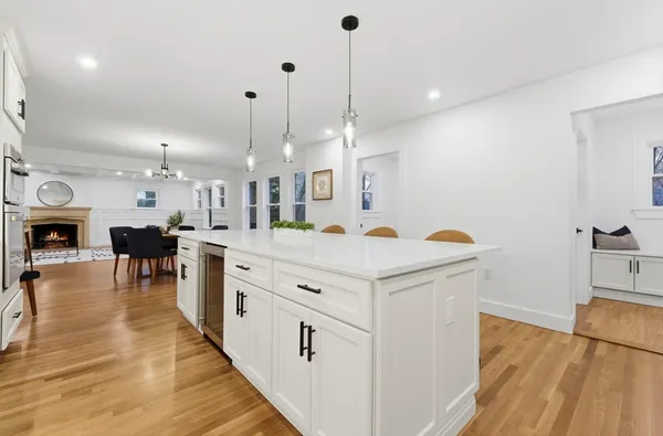 a view of a kitchen and dining room