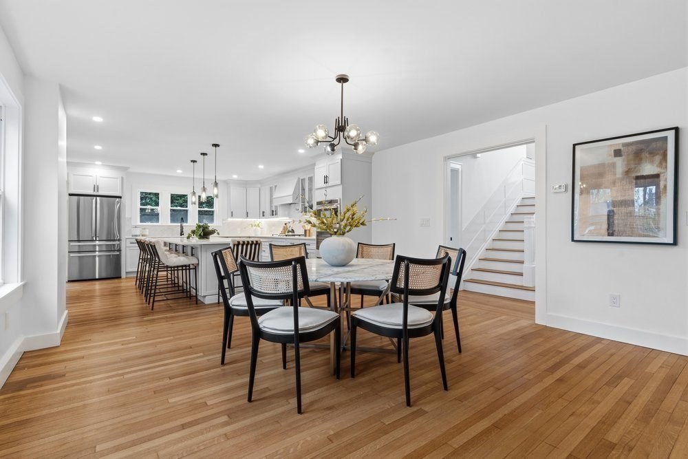 1806 Beacon Street Newton, MA 02468 - Photo 6 of 38 a view of a dining room with furniture wooden floor and chandelier