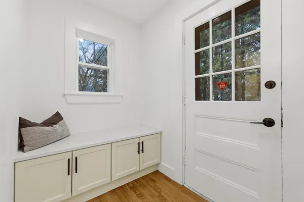 a view of walk in closet and window