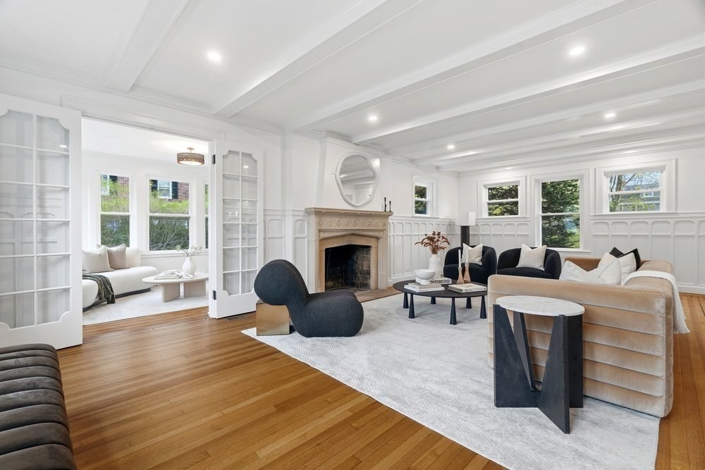 1806 Beacon Street Newton, MA 02468 - Photo 10 of 38 a living room with furniture a large window and a fireplace