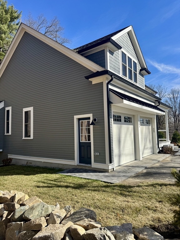 601 Salem End Road Framingham, MA 01702 - Photo 12 of 42 a view of a house with a swimming pool
