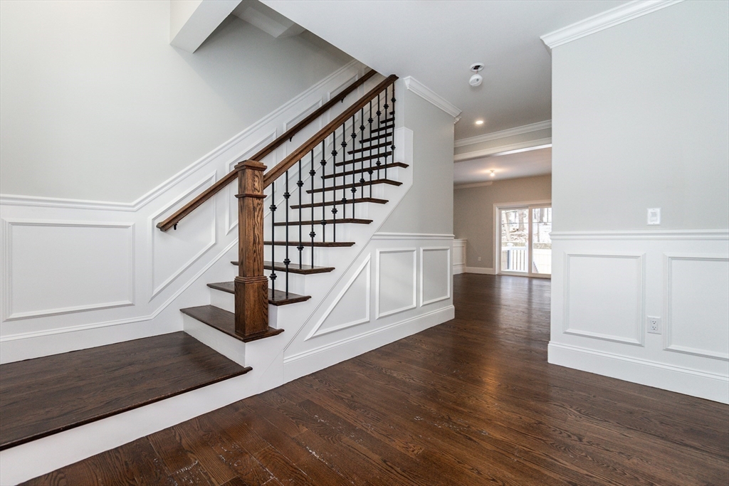 601 Salem End Road Framingham, MA 01702 - Photo 14 of 42 a view of entryway and hall with wooden floor