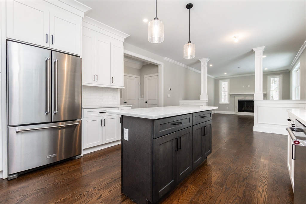 601 Salem End Road Framingham, MA 01702 - Photo 22 of 42 a kitchen with a refrigerator sink and cabinets