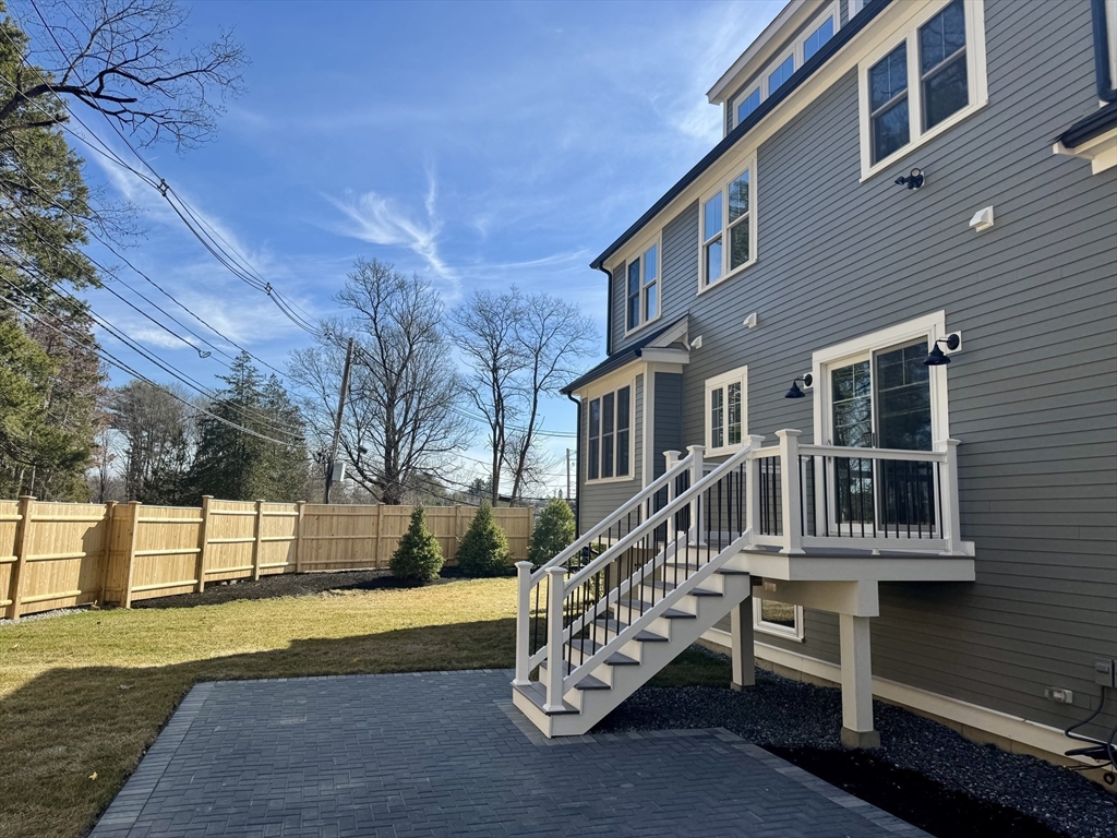 601 Salem End Road Framingham, MA 01702 - Photo 9 of 42 a view of a house with a swimming pool