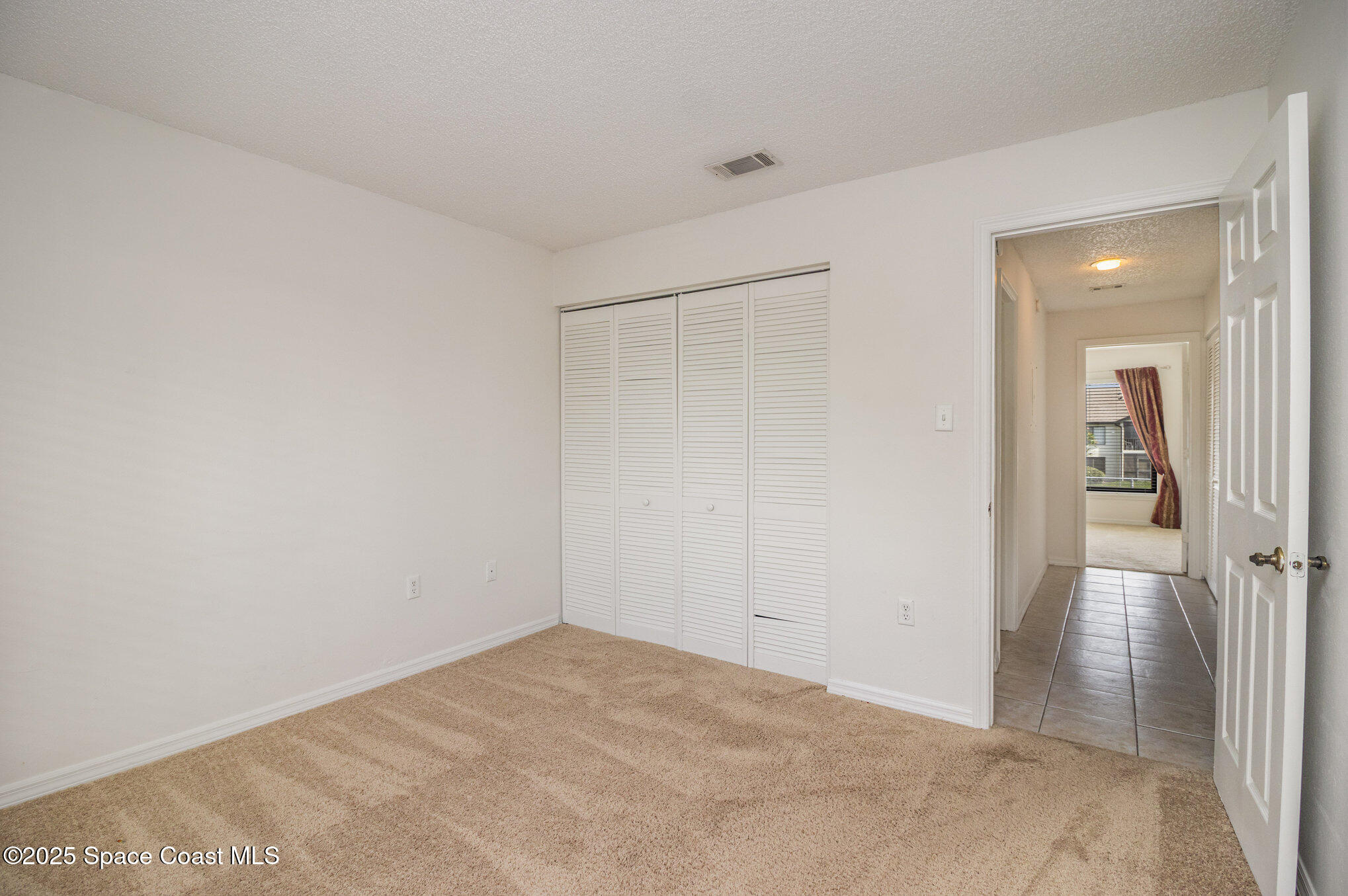 1515 Huntington Lane, Unit 626 Rockledge, FL 32955 - Photo 12 of 14 a view of an empty room