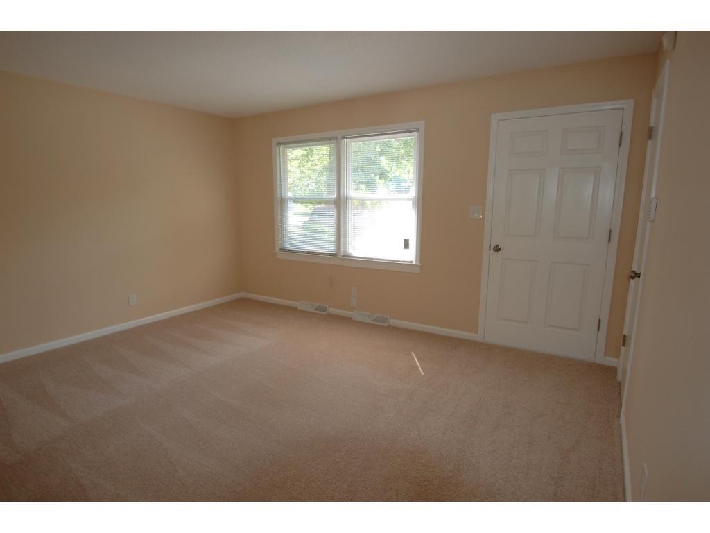 401 Lancaster Road Mebane, NC 27302 - Photo 3 of 15 a view of an empty room with a window