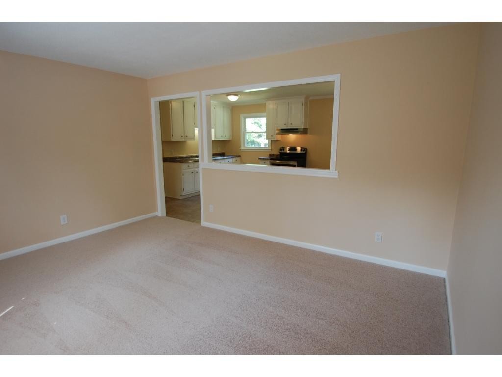 401 Lancaster Road Mebane, NC 27302 - Photo 4 of 15 a view of a kitchen cabinets and a refrigerator