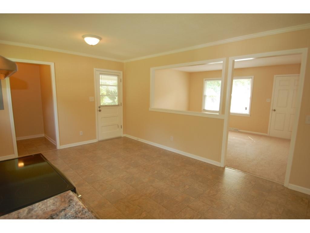 401 Lancaster Road Mebane, NC 27302 - Photo 7 of 15 a view of an empty room and window