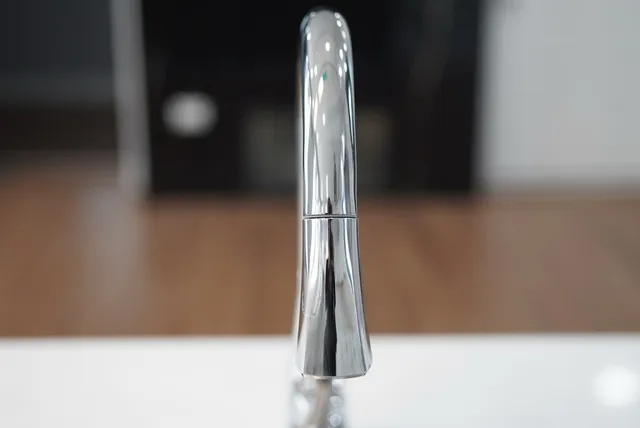 a kitchen with a sink and refrigerator