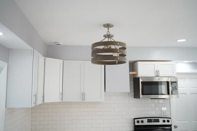a utility room with washer and dryer