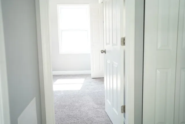 a view of a bathroom with a glass door