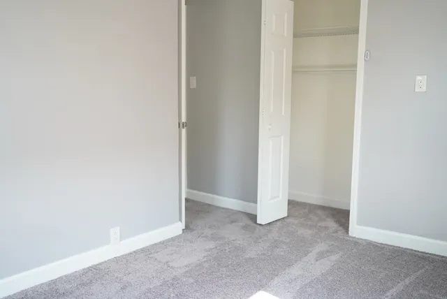 a bathroom with a toilet and a sink