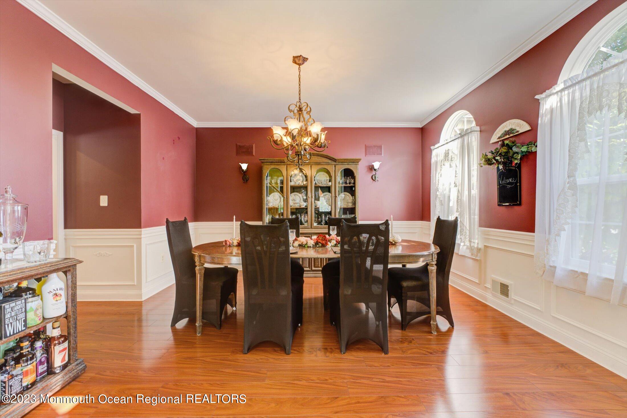 22 Rodeo Drive Jackson, NJ 08527 - Photo 11 of 42 a view of a dining room with furniture and wooden floor