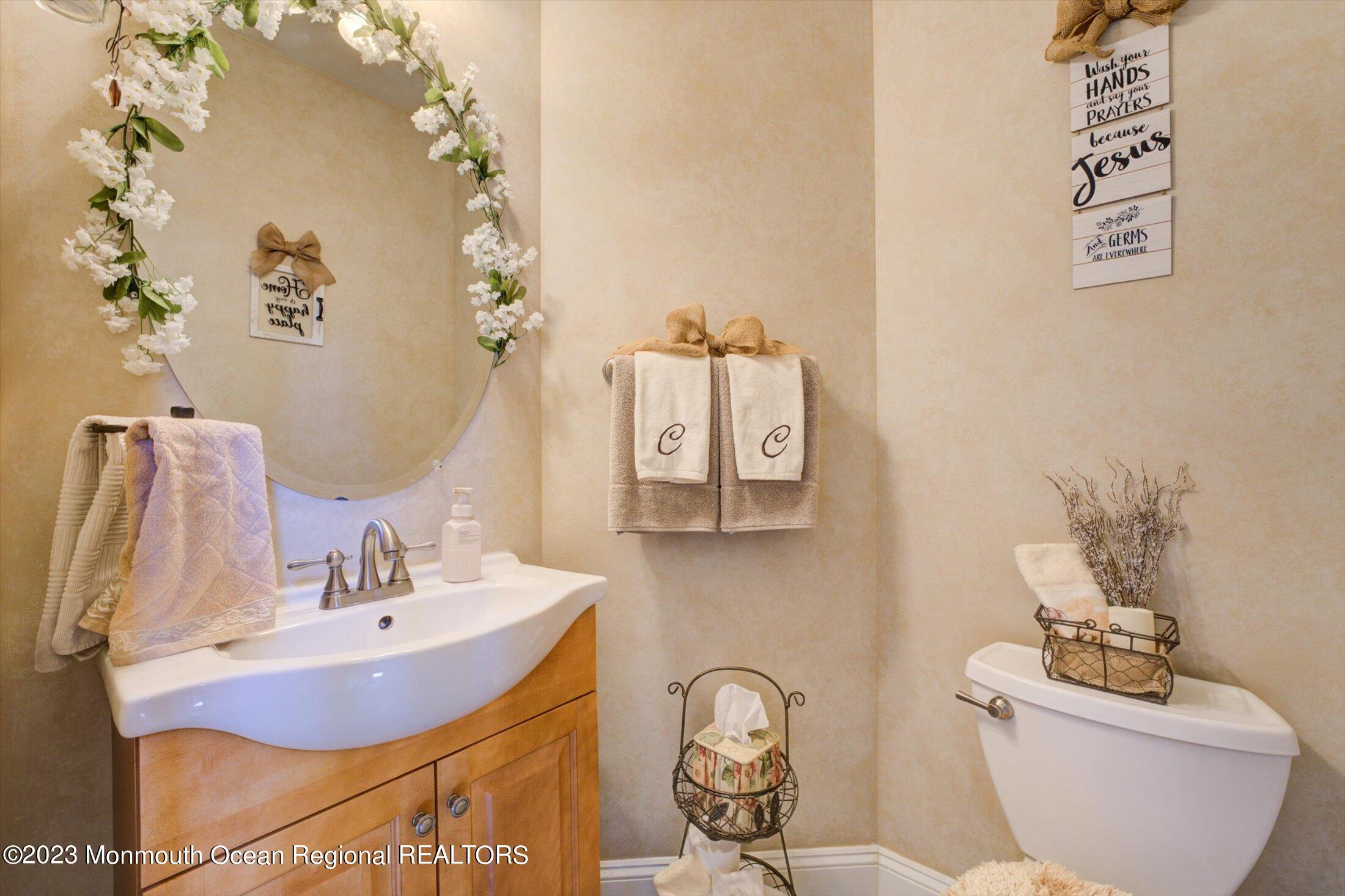 22 Rodeo Drive Jackson, NJ 08527 - Photo 14 of 42 a bathroom with a sink and mirror with toilet