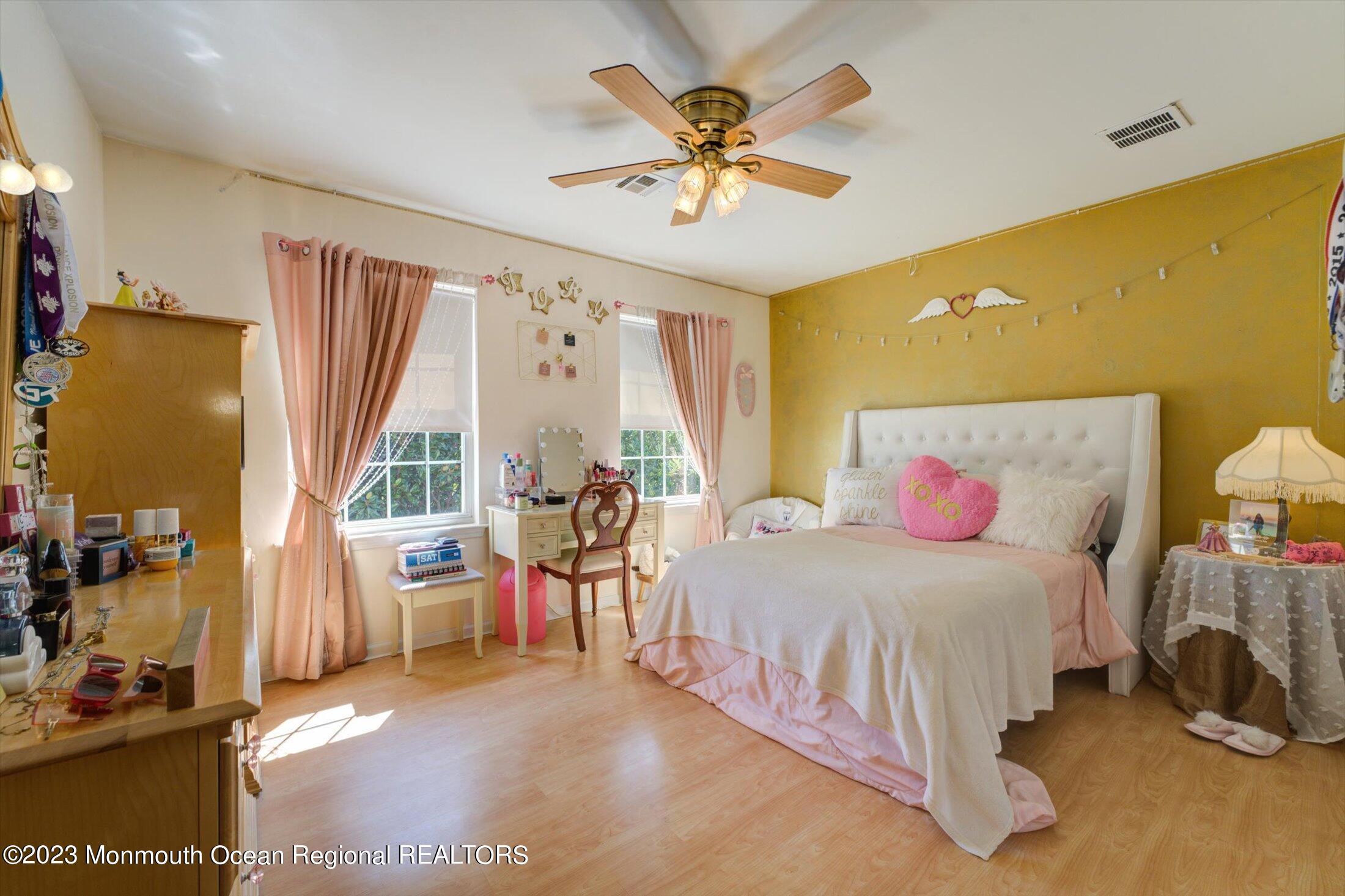 22 Rodeo Drive Jackson, NJ 08527 - Photo 21 of 42 a bedroom with a bed and a table