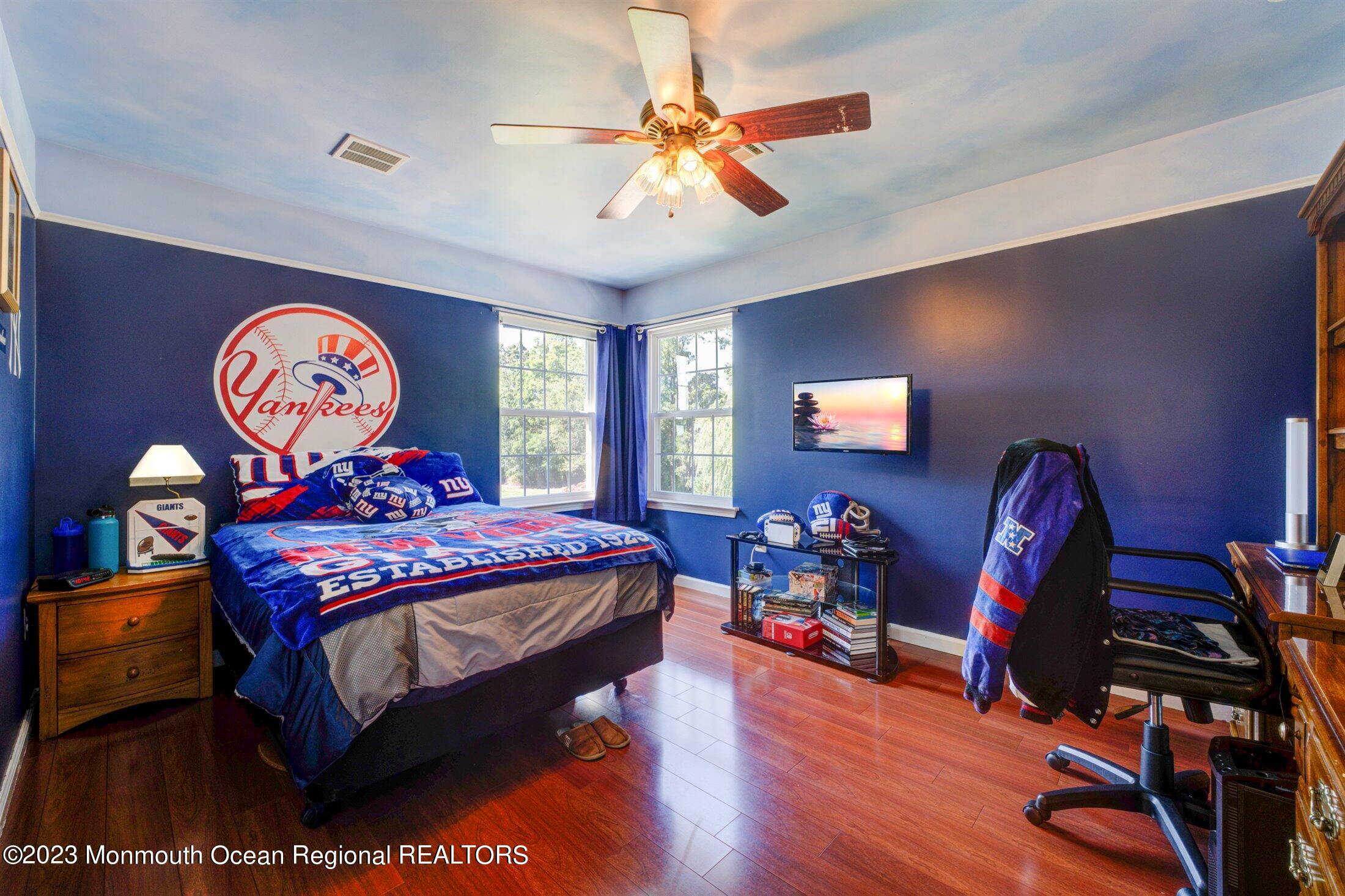 22 Rodeo Drive Jackson, NJ 08527 - Photo 22 of 42 a bedroom with furniture and wooden floor