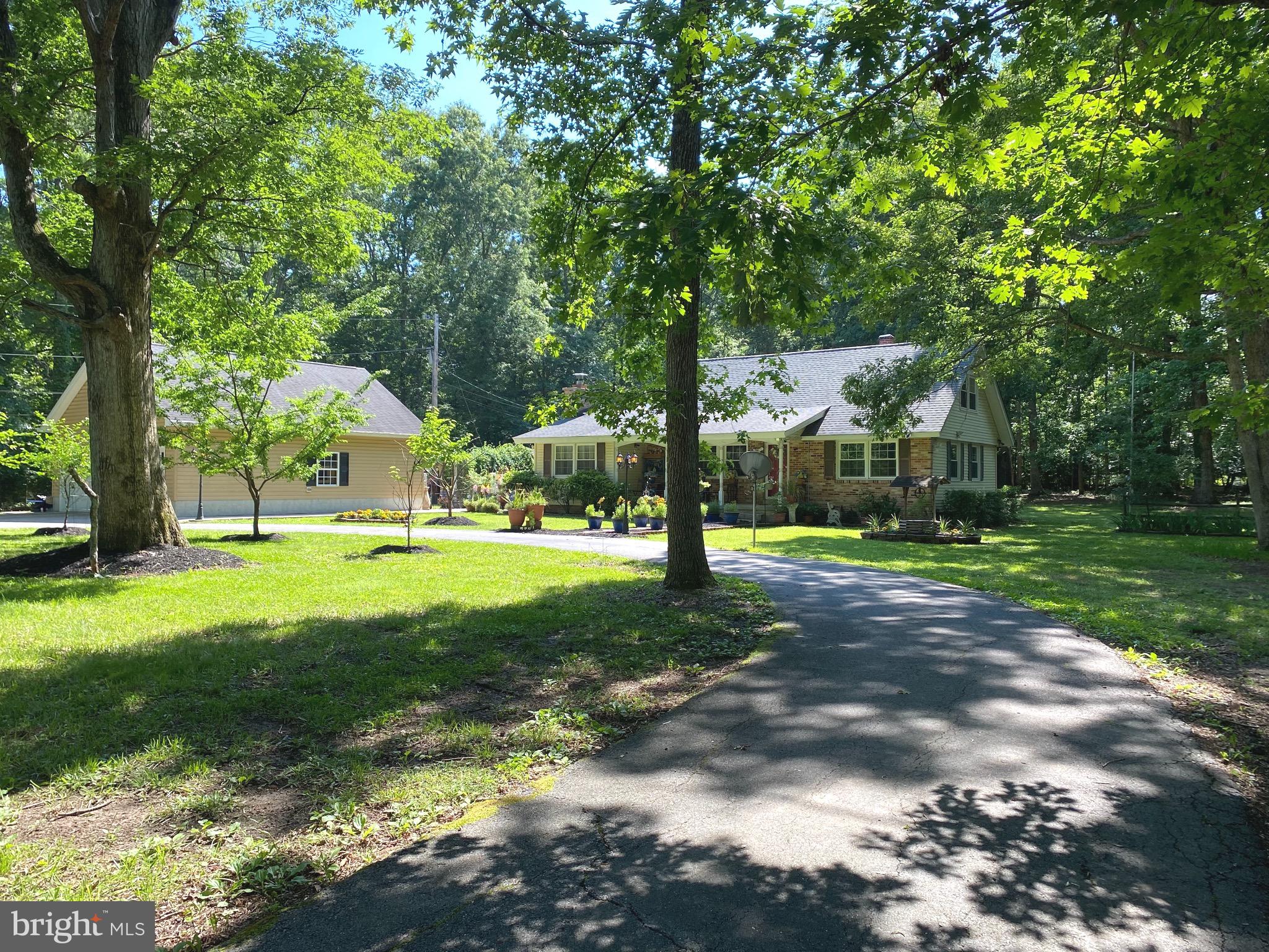 Cape Cod w/ 2-Story Detached Garage on 1.95 Acres.