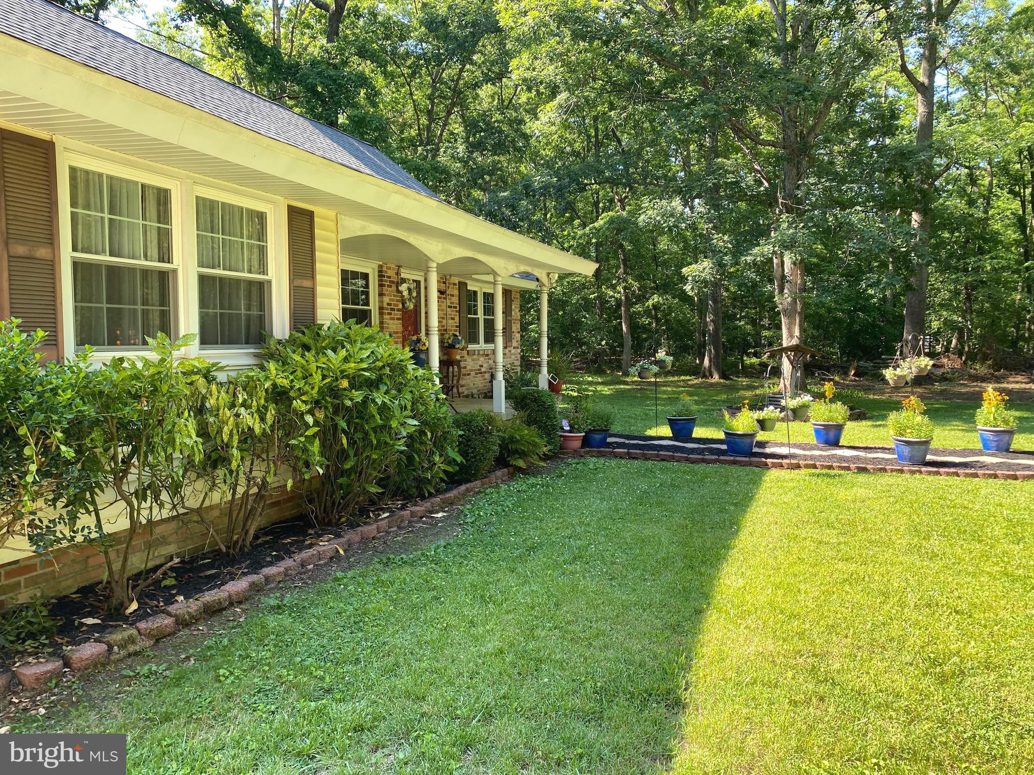 Beautifully landscaped/conscientiously maintained.