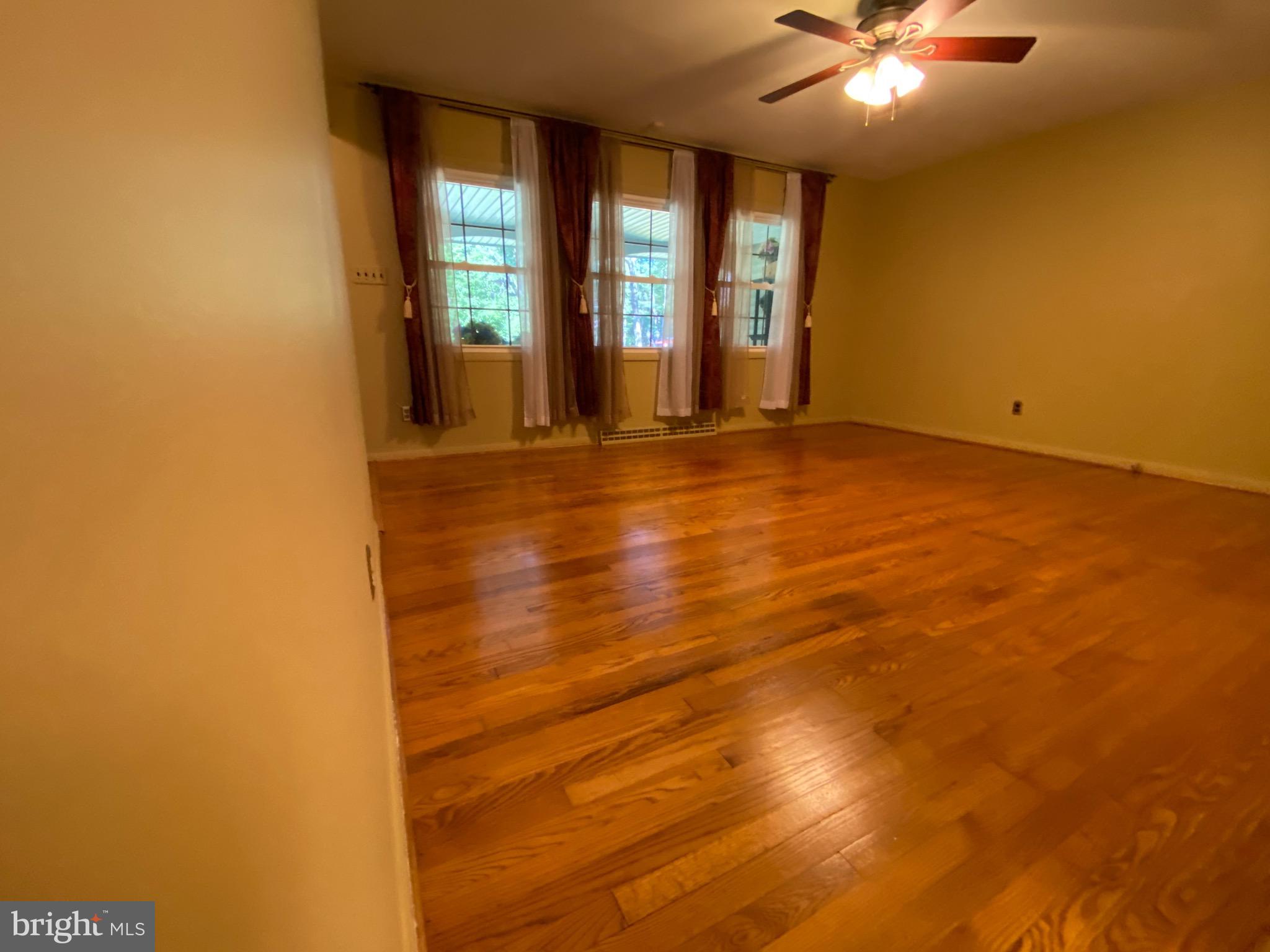3807 Stoneybrook Road White Plains, MD 20695 - Photo 13 of 31 Professionally refinished oak hardwood floors.