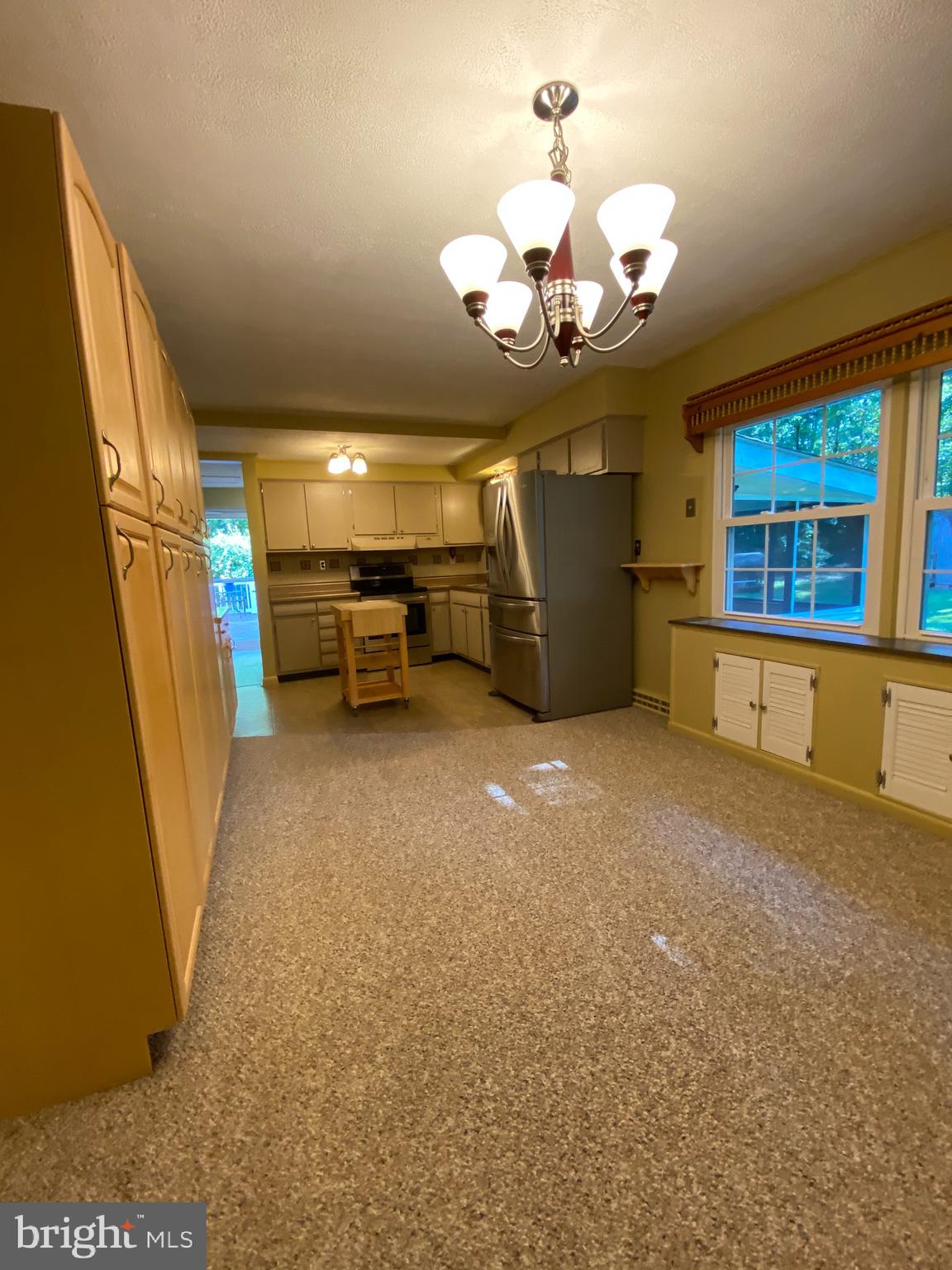 3807 Stoneybrook Road White Plains, MD 20695 - Photo 20 of 31 Kitchen and Dining Area. SS Appliances.