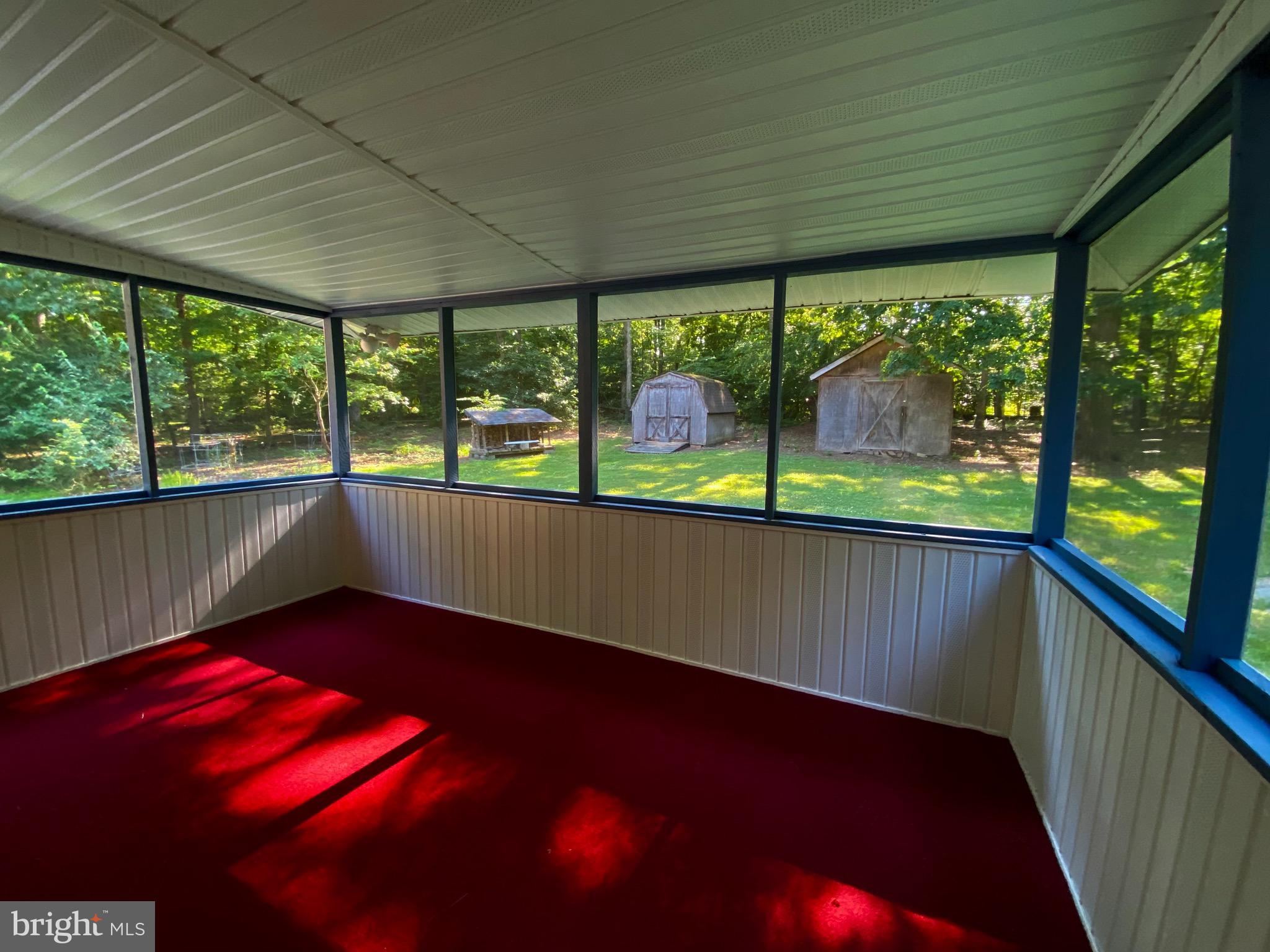 3807 Stoneybrook Road White Plains, MD 20695 - Photo 22 of 31 Screened in porch surrounded by woods. New carpet.