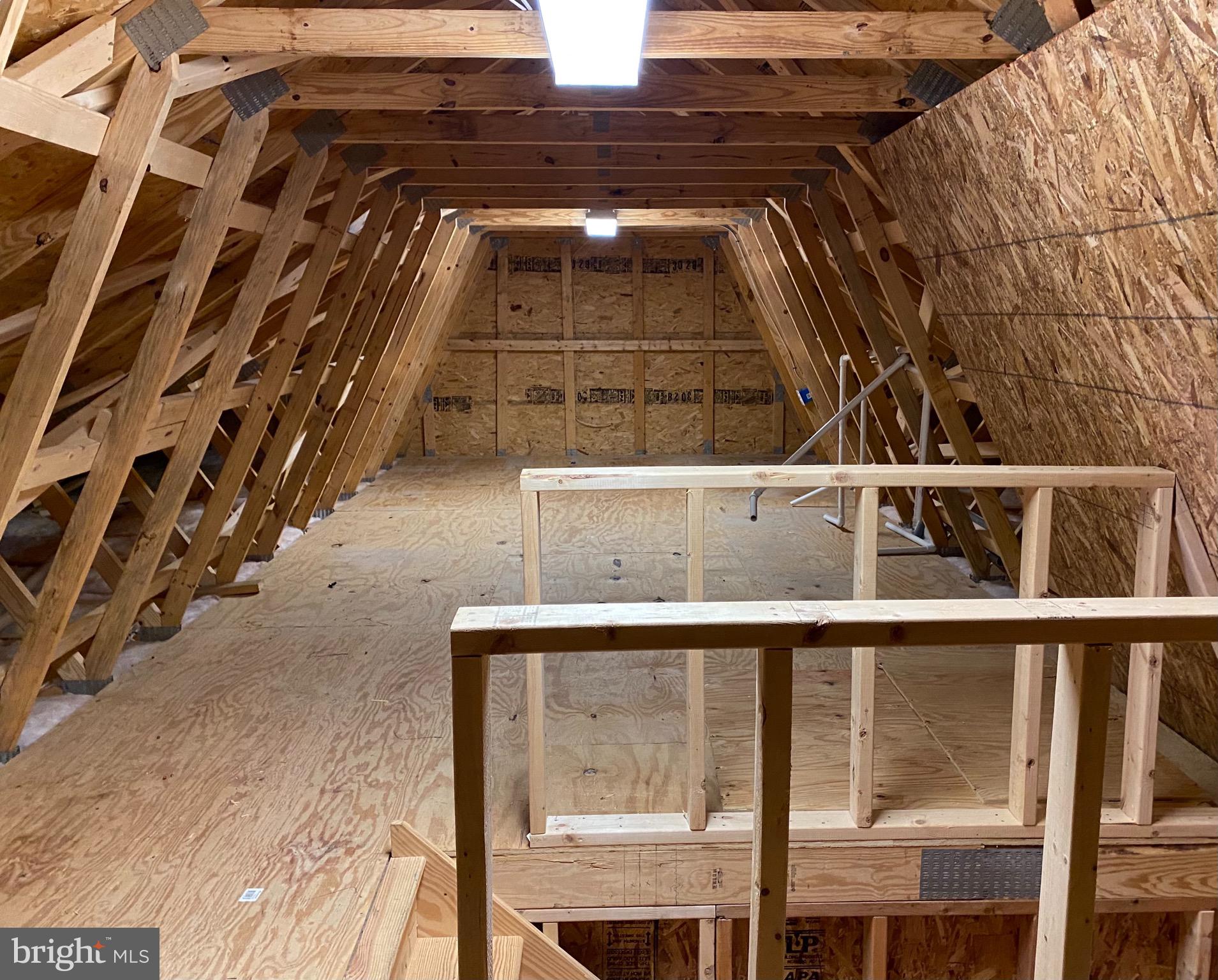 3807 Stoneybrook Road White Plains, MD 20695 - Photo 24 of 31 Massive storage space in second floor of garage.