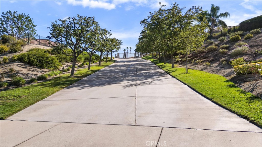 6204 Claridge Drive Riverside, CA 92506 - Photo 24 of 27 Expensive driveway leads to private gate