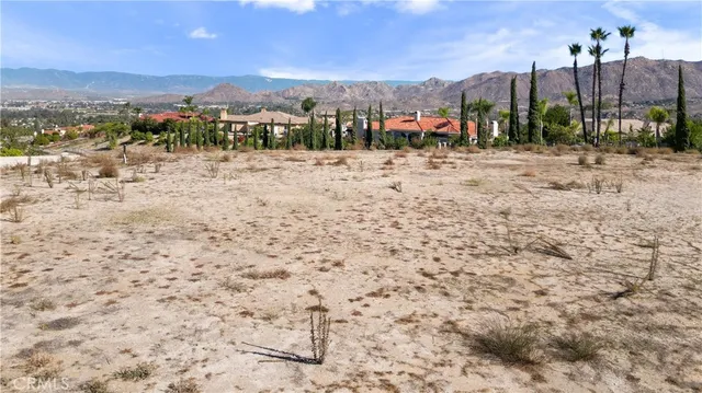 a view of a road with a building in the background