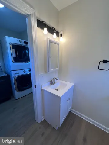 a bathroom with a sink and mirror