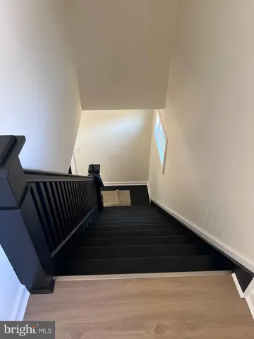 a bathroom with a sink vanity and a mirror