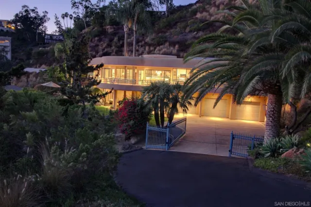 a view of swimming pool from a backyard