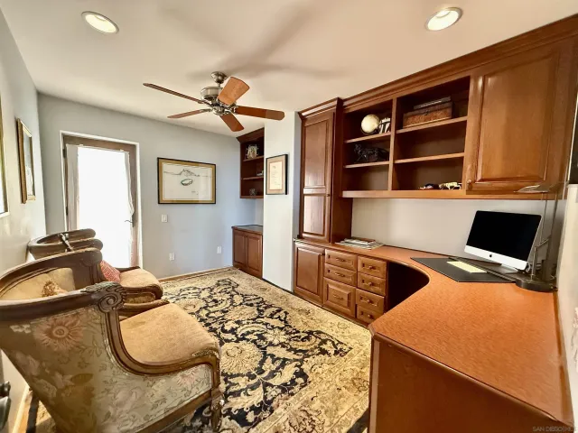 a bedroom with a bed and gym equipment