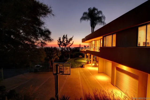 a view of swimming pool with seating space
